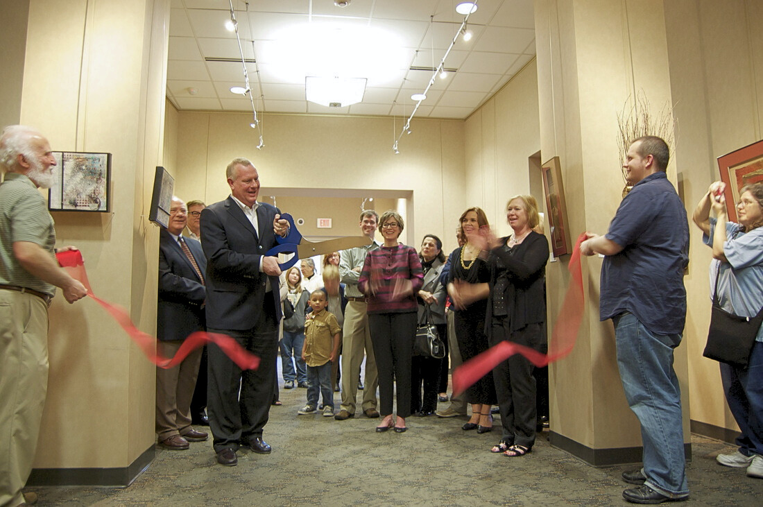 Art Gallery Grand Opening - Mayor Bob Andeweg cutting a ceremonial ribbon in the gallery