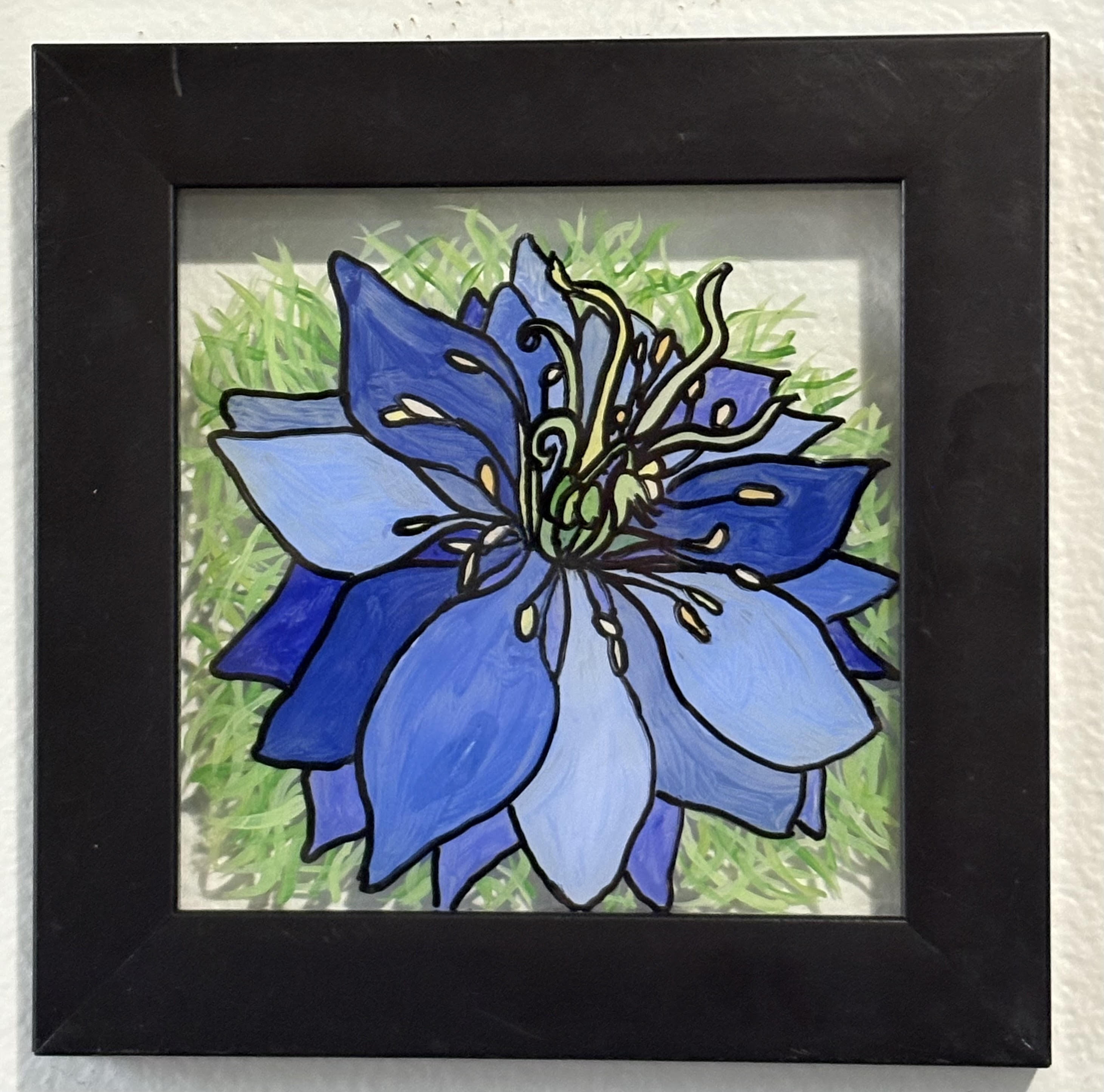 blue flower painted on glass