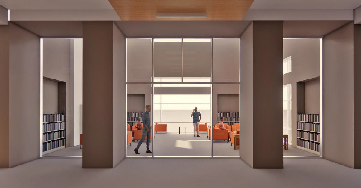 two people using a reading room with glass doors, walls