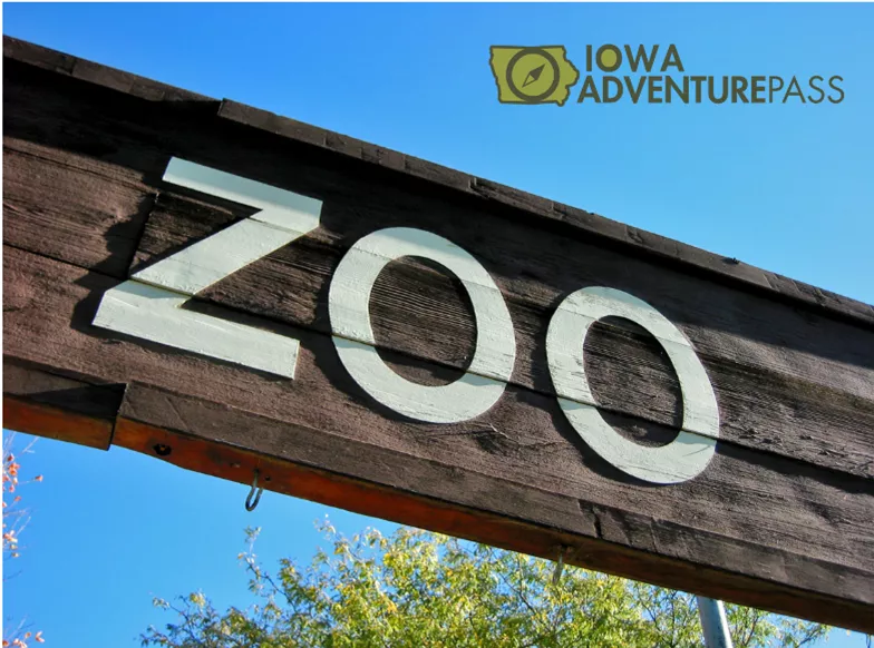 Zoo emblazoned on a sign under Iowa Adventure Pass logo